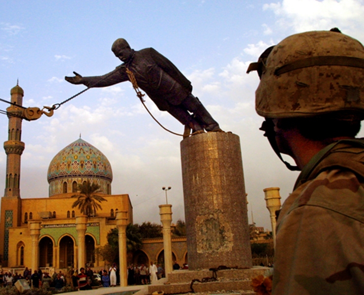 The Moment Of The Falling Of Saddam's Statue, With The Help Of The US Army.