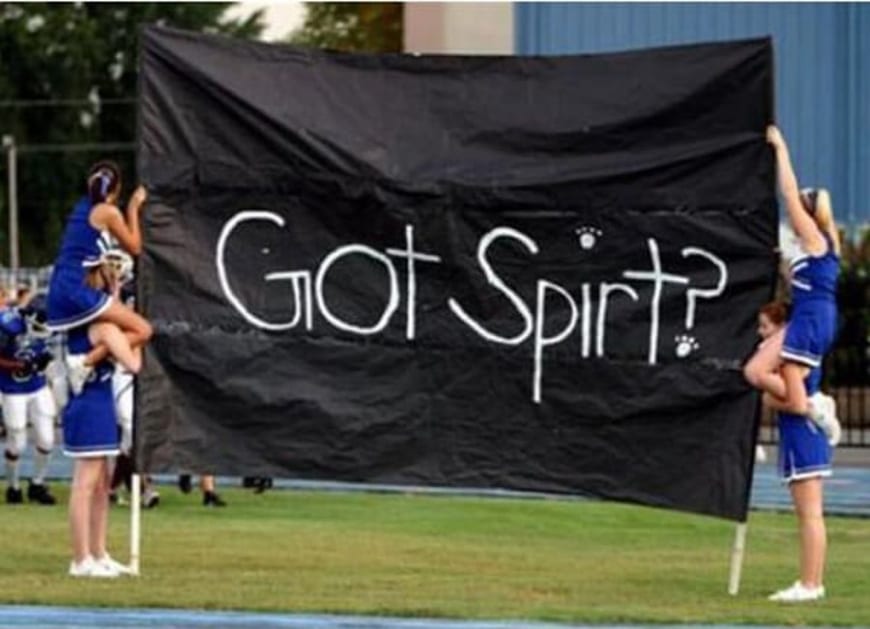 Cheerleaders With A Misspelled Sign