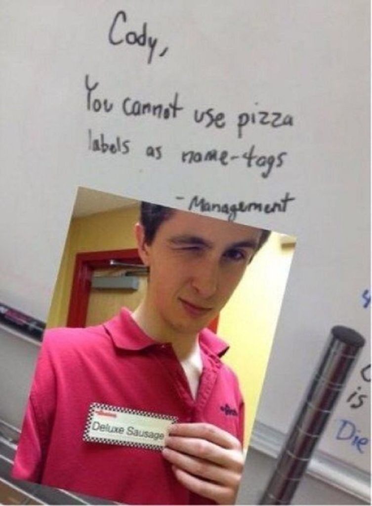 Boy With A Pizza Label As A Name Tag