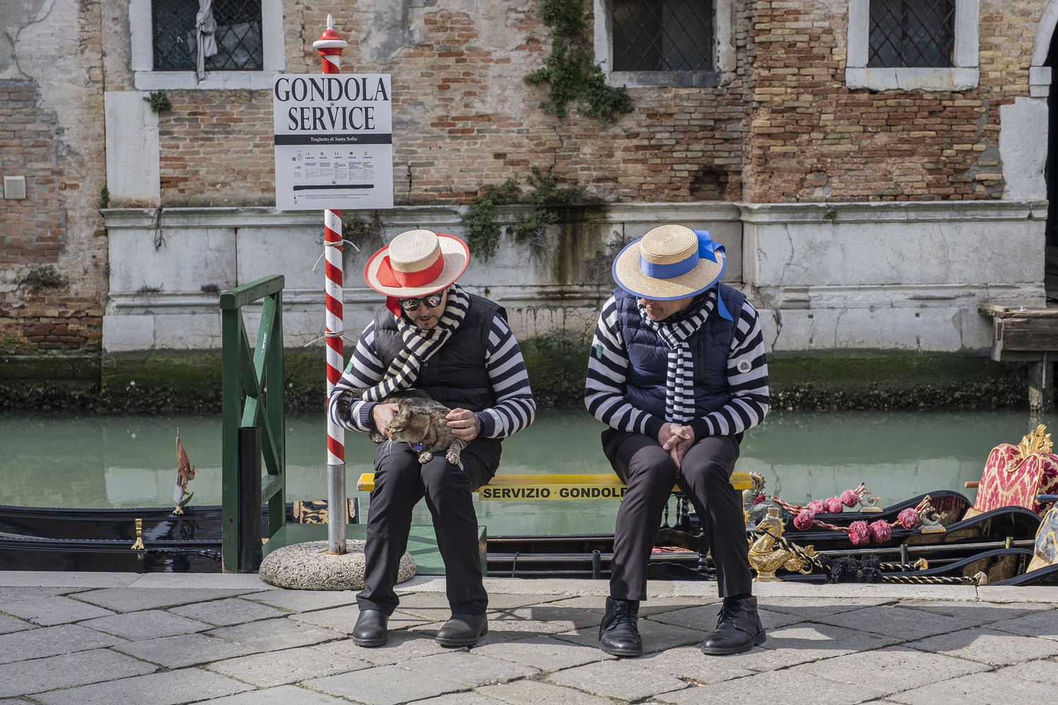 Idle Gondoliers In Venice, Italy