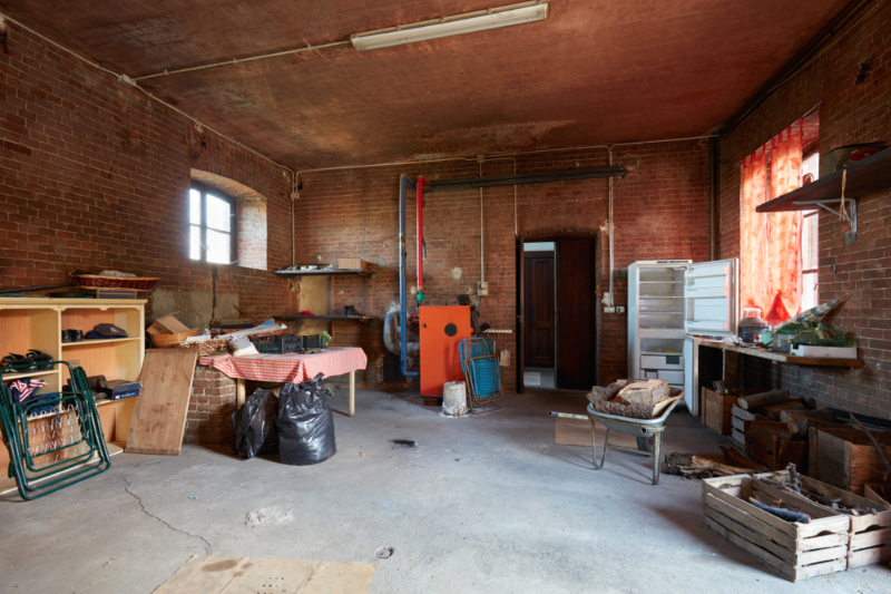 Messy,Basement,With,Red,Bricks,Walls,In,Old,Country,House